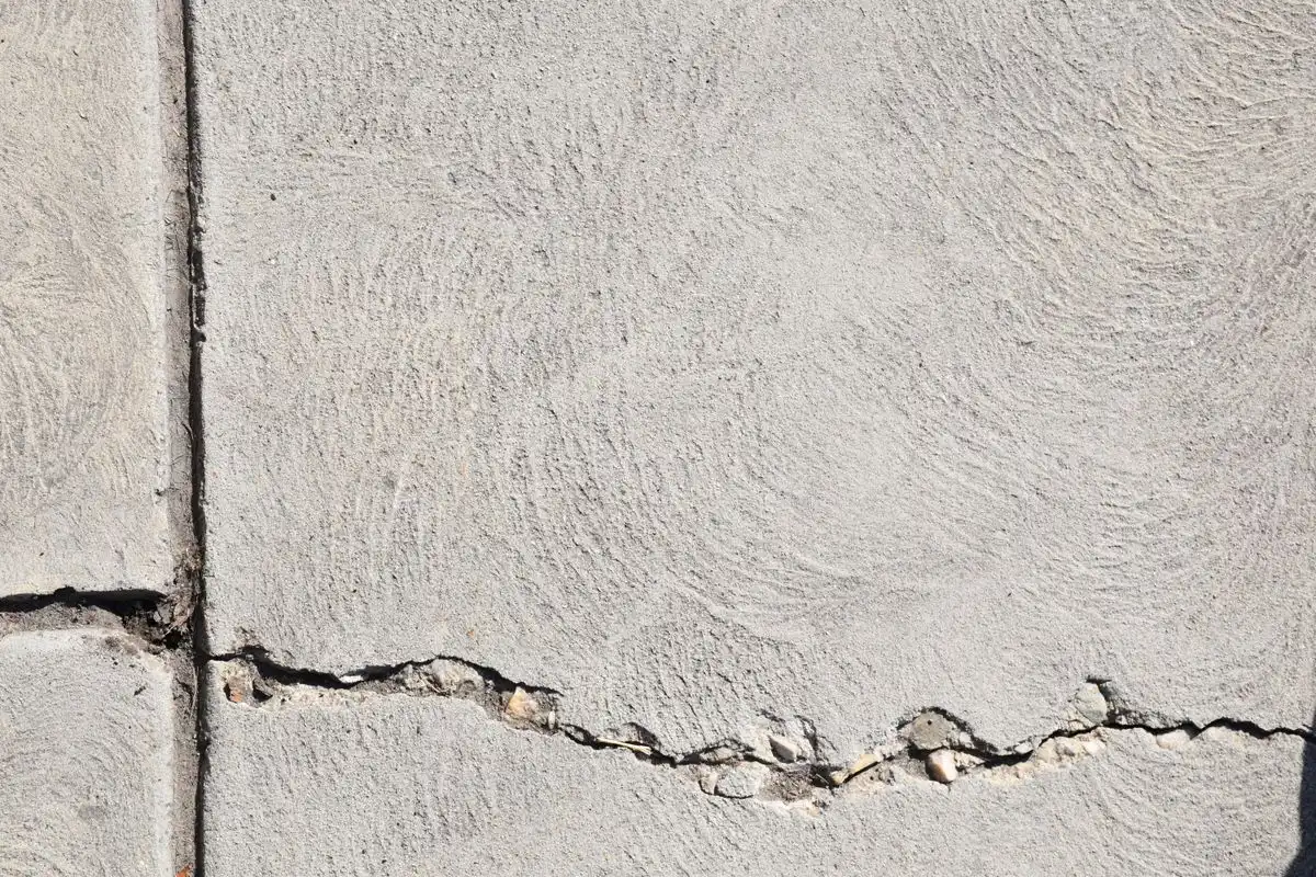 Close-up of a crack running across a concrete slab